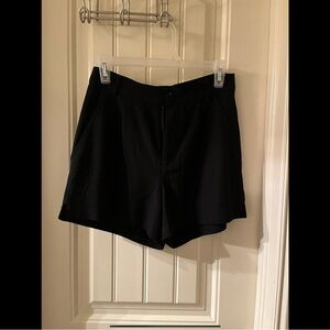 Elegant Black Brass Clothing Company “All Day” shorts.